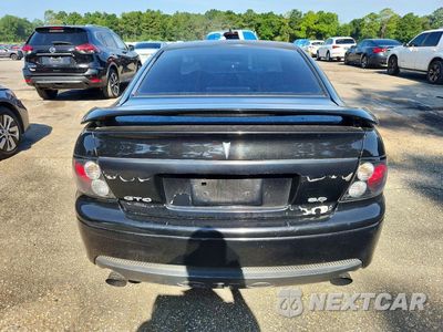 Zdjęcie 6 z 13 samochodu: 2006 PONTIAC GTO VIN:6G2VX12UX6L820026 - miniatura
