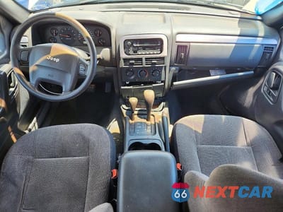 Zdjęcie 8 z 13 samochodu: 2001 JEEP GRAND CHEROKEE LAREDO VIN:1J4GW48S21C686417 - miniatura
