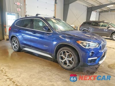 Czwarte zdjęcie samochodu z boku: 2016 BMW X1 XDRIVE28I VIN:WBXHT3C32GP883105 - miniatura