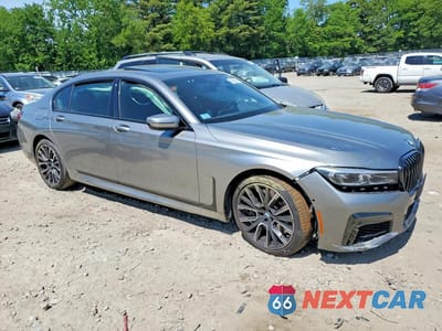 Czwarte zdjęcie samochodu z boku: 2022 BMW 750 XI VIN:WBA7U2C06NCG82513 - miniatura