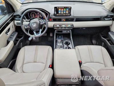 Zdjęcie 8 z 14 samochodu: 2023 HONDA PILOT TOURING VIN:5FNYG1H76PB034526 - miniatura