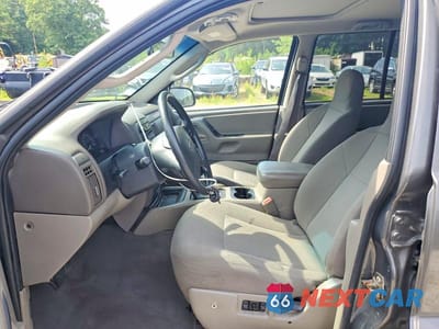 Zdjęcie 7 z 12 samochodu: 2004 JEEP GRAND CHEROKEE LAREDO VIN:1J4GW48S24C371430 - miniatura