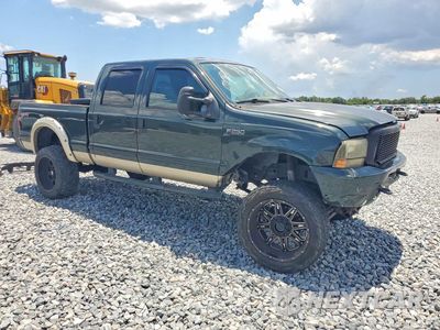 Czwarte zdjęcie samochodu z boku: 2003 FORD F250 SUPER DUTY VIN:1FTNW21L43EB69499 - miniatura