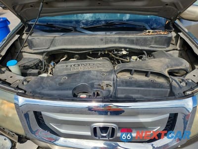 Zdjęcie 12 z 13 samochodu: 2011 HONDA PILOT EXL VIN:5FNYF3H56BB033138 - miniatura
