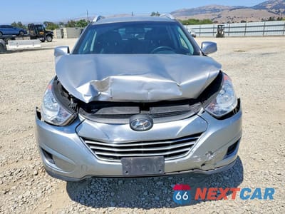 Piąte zdjęcie samochodu w środku: 2011 HYUNDAI TUCSON GLS VIN:KM8JU3AC1BU239454 - miniatura