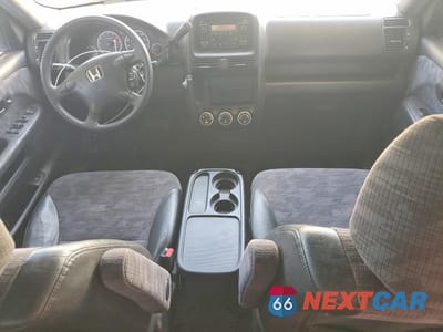 Zdjęcie 8 z 13 samochodu: 2003 HONDA CR-V LX VIN:JHLRD68433C005639 - miniatura