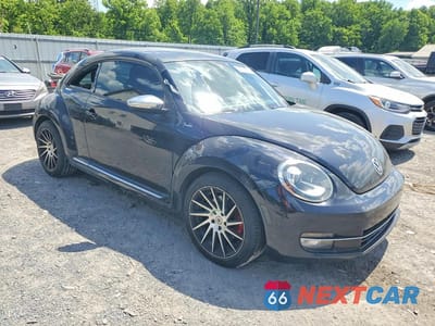 Czwarte zdjęcie samochodu z boku: 2013 VOLKSWAGEN BEETLE TURBO VIN:3VWVA7ATXDM646506 - miniatura