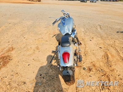 Czwarte zdjęcie samochodu z boku: 2006 HONDA VTX1300 C VIN:1HFSC55036A212812 - miniatura