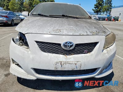 Piąte zdjęcie samochodu w środku: 2010 TOYOTA COROLLA S VIN:1NXBU4EE7AZ263682 - miniatura