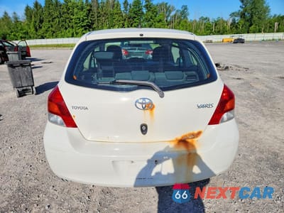 Zdjęcie 6 z 12 samochodu: 2009 TOYOTA YARIS BASE VIN:JTDJT903295263407 - miniatura