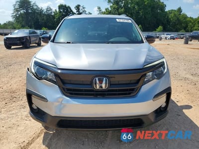 Piąte zdjęcie samochodu w środku: 2022 HONDA PILOT SPORT VIN:5FNYF5H39NB026957 - miniatura