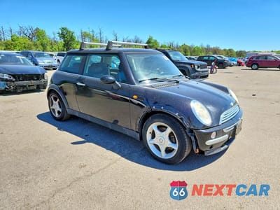 Czwarte zdjęcie samochodu z boku: 2003 MINI COOPER VIN:WMWRC33483TE18548 - miniatura