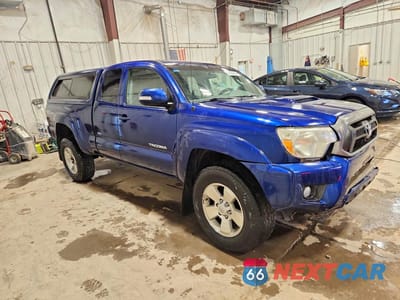 Czwarte zdjęcie samochodu z boku: 2015 TOYOTA TACOMA V6 VIN:5TFUU4EN1FX125624 - miniatura