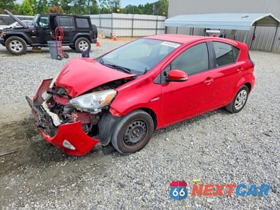 2015 TOYOTA PRIUS C ONE JTDKDTB34F1576036 - główne zdjęcie licytacji z USA - miniatura