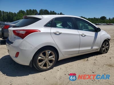 Trzecie zdjęcie samochodu z tyłu: 2013 HYUNDAI ELANTRA GT BASE VIN:KMHD35LE2DU103749 - miniatura