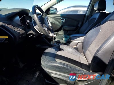 Zdjęcie 7 z 13 samochodu: 2012 HYUNDAI TUCSON GLS VIN:KM8JUCAC5CU497039 - miniatura