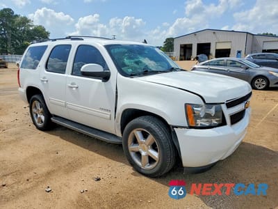 Czwarte zdjęcie samochodu z boku: 2012 CHEVROLET TAHOE C1500 LT VIN:1GNSCBE09CR117037 - miniatura
