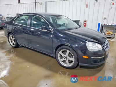Czwarte zdjęcie samochodu z boku: 2010 VOLKSWAGEN JETTA SE VIN:3VWRZ7AJ9AM065129 - miniatura