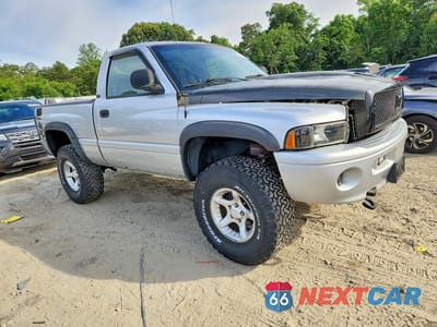 Czwarte zdjęcie samochodu z boku: 2001 DODGE RAM 1500 VIN:1B7HF16Z61S166414 - miniatura