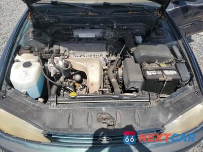 Zdjęcie 11 z 12 samochodu: 1993 TOYOTA CAMRY XLE VIN:4T1SK13E9PU248682 - miniatura