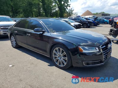 Czwarte zdjęcie samochodu z boku: 2015 AUDI A8 L QUATTRO VIN:WAU32AFD9FN016228 - miniatura