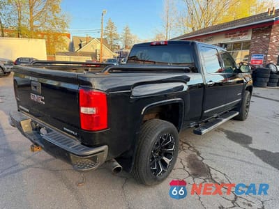 Czwarte zdjęcie samochodu z boku: 2015 GMC SIERRA K1500 DENALI VIN:3GTU2WEJXFG435869 - miniatura