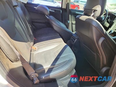 Zdjęcie 10 z 13 samochodu: 2014 FORD FUSION TITANIUM PHEV VIN:3FA6P0SU6ER150696 - miniatura