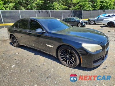 Czwarte zdjęcie samochodu z boku: 2015 BMW 740 LXI VIN:WBAYF4C57FGS99077 - miniatura