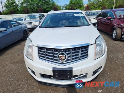 Piąte zdjęcie samochodu w środku: 2015 CADILLAC SRX PERFORMANCE COLLECTION VIN:3GYFNFE32FS527079 - miniatura