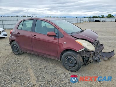 Czwarte zdjęcie samochodu z boku: 2010 TOYOTA YARIS BASE VIN:JTDKT4K39A5294498 - miniatura