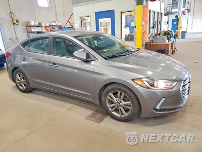 Czwarte zdjęcie samochodu z boku: 2018 HYUNDAI ELANTRA VALUE EDITION VIN:5NPD84LF5JH320355 - miniatura