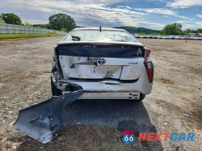 Zdjęcie 6 z 13 samochodu: 2017 TOYOTA PRIUS TWO VIN:JTDKBRFU0H3546096 - miniatura