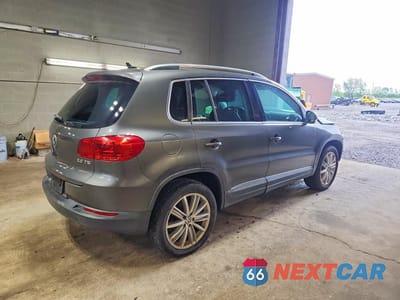 Trzecie zdjęcie samochodu z tyłu: 2014 VOLKSWAGEN TIGUAN S VIN:WVGAV3AX4EW616514 - miniatura