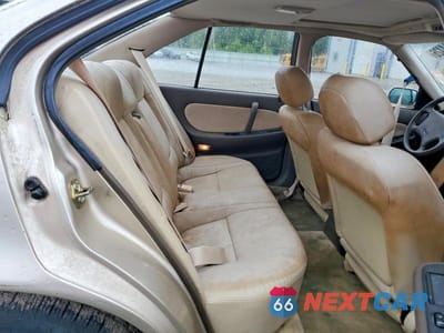 Zdjęcie 10 z 12 samochodu: 1992 NISSAN MAXIMA GXE VIN:JN1HJ01P7NT605525 - miniatura