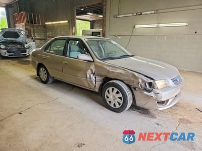 Czwarte zdjęcie samochodu z boku: 2001 TOYOTA COROLLA LE VIN:1NXBR12E61Z558048 - miniatura