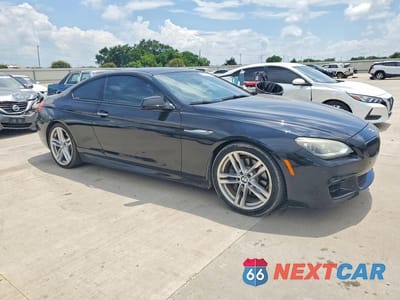 Czwarte zdjęcie samochodu z boku: 2015 BMW 640 I VIN:WBALW3C50FC893053 - miniatura