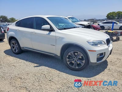 Czwarte zdjęcie samochodu z boku: 2014 BMW X6 XDRIVE35I VIN:5UXFG2C53E0H10057 - miniatura