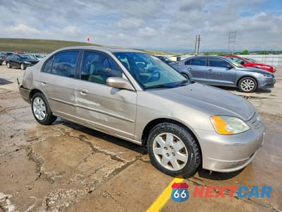 Czwarte zdjęcie samochodu z boku: 2001 HONDA CIVIC EX VIN:1HGES26701L051998 - miniatura