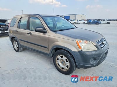 Czwarte zdjęcie samochodu z boku: 2005 HONDA CR-V LX VIN:JHLRD68555C017769 - miniatura