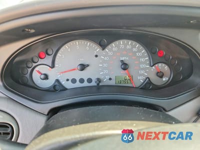 Zdjęcie 9 z 12 samochodu: 2003 FORD FOCUS ZX5 VIN:3FAHP37323R133658 - miniatura