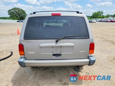 Zdjęcie 6 z 12 samochodu: 2001 JEEP CHEROKEE SPORT VIN:1J4FF48S71L536184 - miniatura