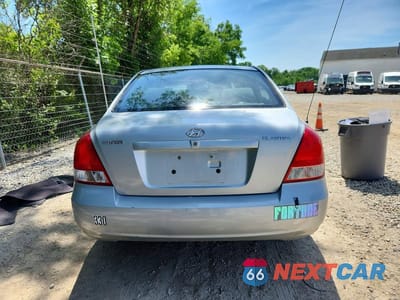 Zdjęcie 6 z 12 samochodu: 2003 HYUNDAI ELANTRA GLS VIN:KMHDN45D23U680045 - miniatura