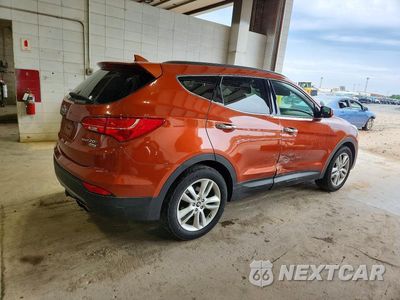 Trzecie zdjęcie samochodu z tyłu: 2014 HYUNDAI SANTA FE SPORT 2.0T VIN:5XYZWDLA3EG231851 - miniatura