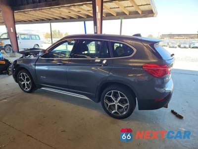 Drugie zdjęcie samochodu z przodu: 2018 BMW X1 VIN:WBXHT3C37J5F91908 - miniatura