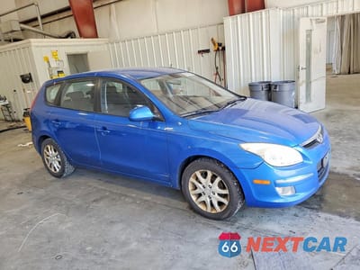 Czwarte zdjęcie samochodu z boku: 2009 HYUNDAI ELANTRA VIN:KMHDC86E49U038522 - miniatura