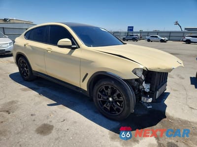 Czwarte zdjęcie samochodu z boku: 2022 BMW X4 XDRIVE30I VIN:5UX33DT00N9K67342 - miniatura