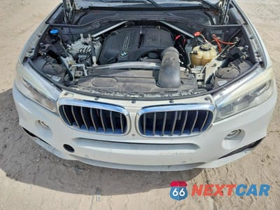 Zdjęcie 12 z 13 samochodu: 2017 BMW X5 SDRIVE35I VIN:5UXKR2C50H0U19722 - miniatura