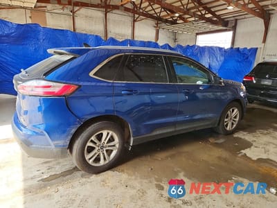 Trzecie zdjęcie samochodu z tyłu: 2020 FORD EDGE SEL VIN:2FMPK4J99LBB25509 - miniatura