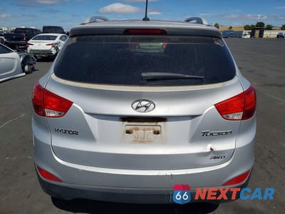Zdjęcie 6 z 12 samochodu: 2013 HYUNDAI TUCSON GLS VIN:KM8JUCAC5DU608917 - miniatura