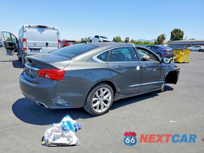 Trzecie zdjęcie samochodu z tyłu: 2014 CHEVROLET IMPALA LTZ VIN:1G1155S33EU109832 - miniatura